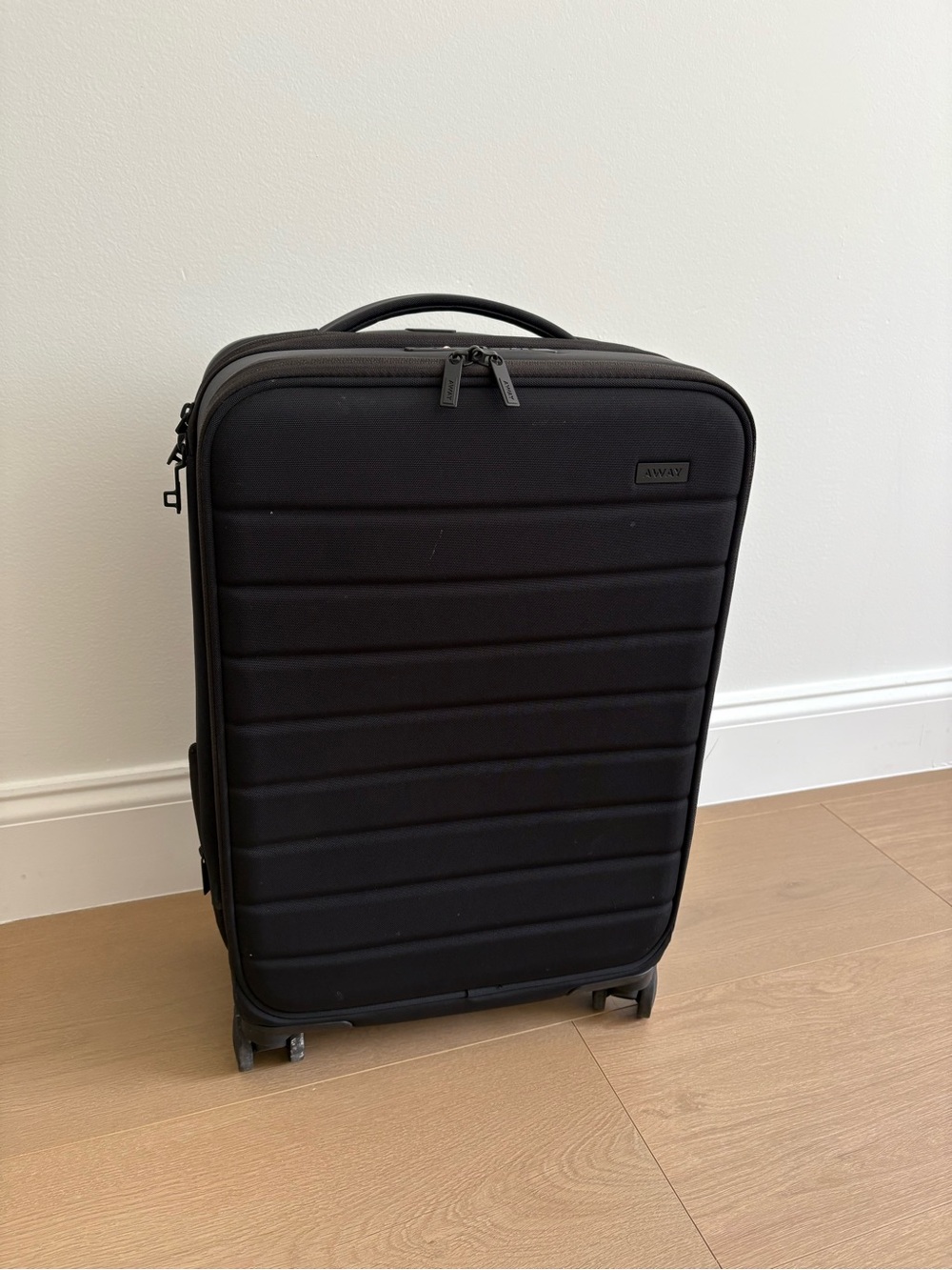 Away Black Carry-On Travel Case with Spinner Wheels (expandable collection)